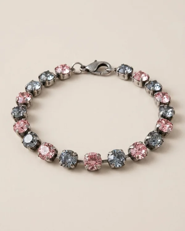 Ad creative A: the bracelet in pink and grey crystals